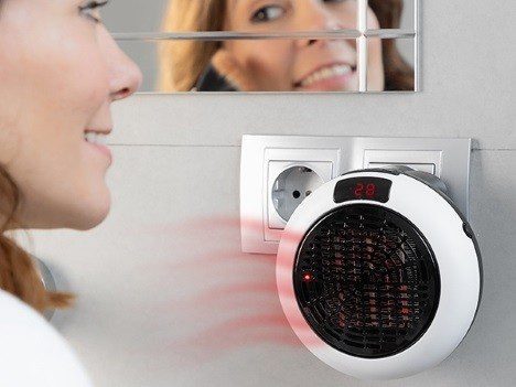 Aquecedor Cerâmico Redondo de Tomada com Comando 1000 watts