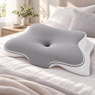 Almofada cervical numa cama